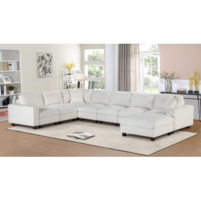Canapé modulaire en chenille avec repose-pieds Elara