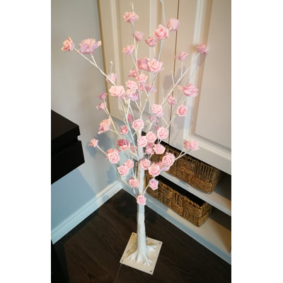 Plante florale à lumières del rose