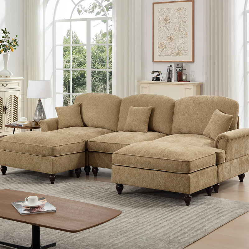 Confortable et modulaire avec des dossiers en forme de fleur, des pétales évasés et des jupes détachables, un café en chenille à 3 sièges modulaires en forme de U avec des volants et des repose-pieds mobiles, segmenté
