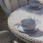 Anissah 4 - Person Patio Dining Set with Round Table