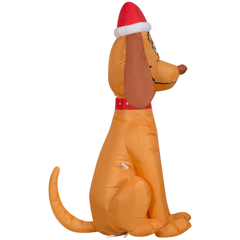 Gonflable Max le chien portant un chapeau de père Noël gonflable