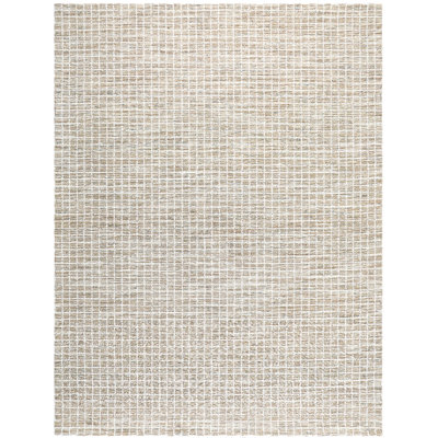 Tapis beige touffeté à la main