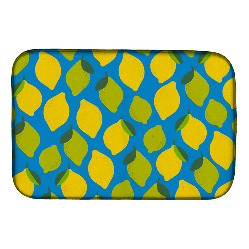 Citrons et limes sur tapis de séchage, Bleu
