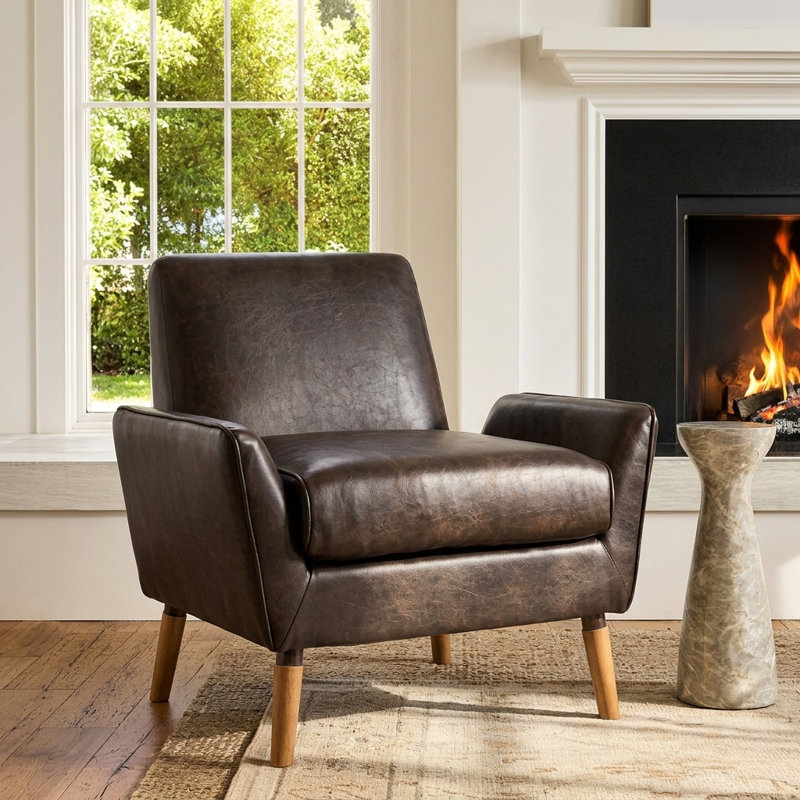 Fauteuil d'appoint Vireo en similicuir avec accoudoirs et pieds en bois d'hévéa pour salon