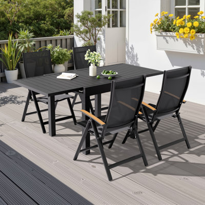 4 - Person Aluminum Patio Dining Set with Extendable Table and Folded Reclining Armchairs