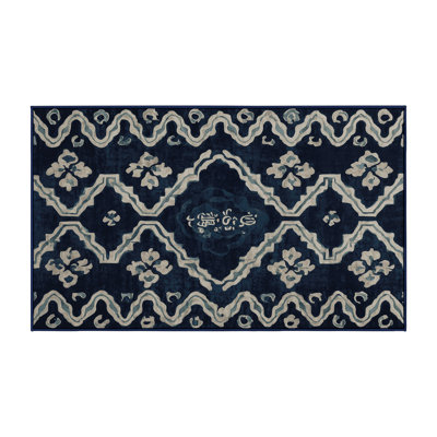 Tapis gris lavable à la machine