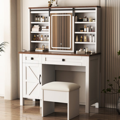 Meuble-lavabo avec miroir coulissant et lumières