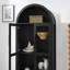 Une armoire de rangement arquée haute avec une lampe-892020588