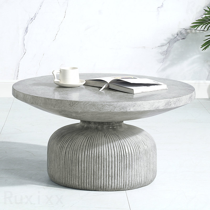 Table basse grise patinée avec plateau rond et base piédestal
