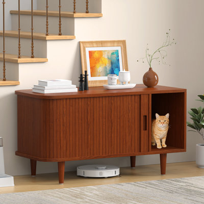 Meuble de rangement discret pour litière de style moderne du milieu du siècle, avec design incurvé en demi-cercle, table d'appoint en bois en forme de maison pour chat, meuble à litière pour chats d'intérieur offrant une intimité optimale.
