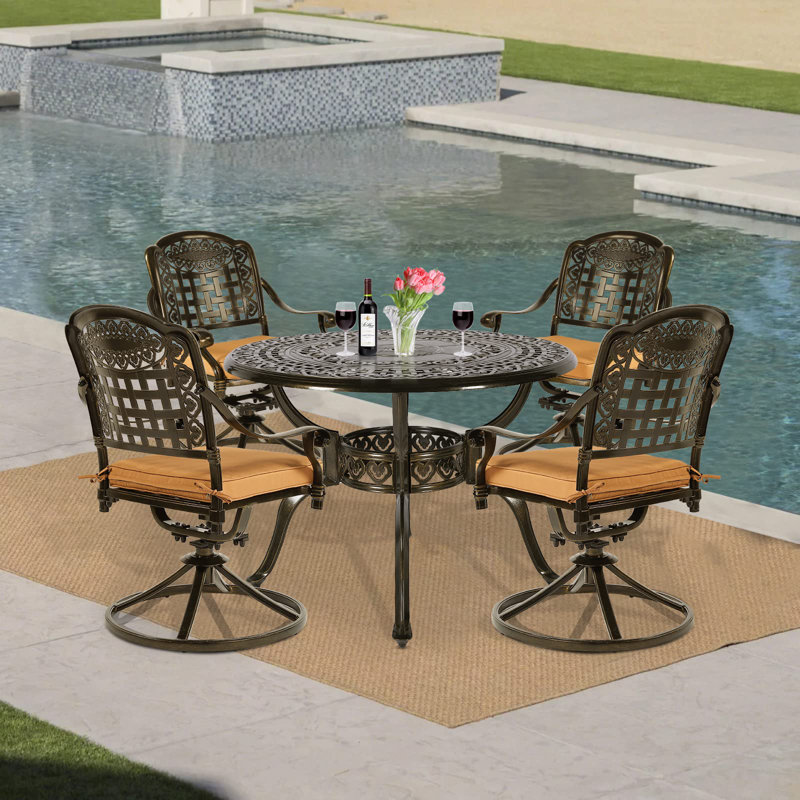 Meadview 4 - Person Patio Dining Set with Round Table , Cushions Included