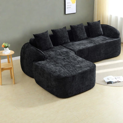 Space-saving Black L-shaped Sofas With Curved Armrests For Modern Living Rooms