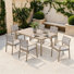 Ensemble repas d'extérieur 7 pièces avec trou pour parasol, coussins et chaises empilables Andersonville