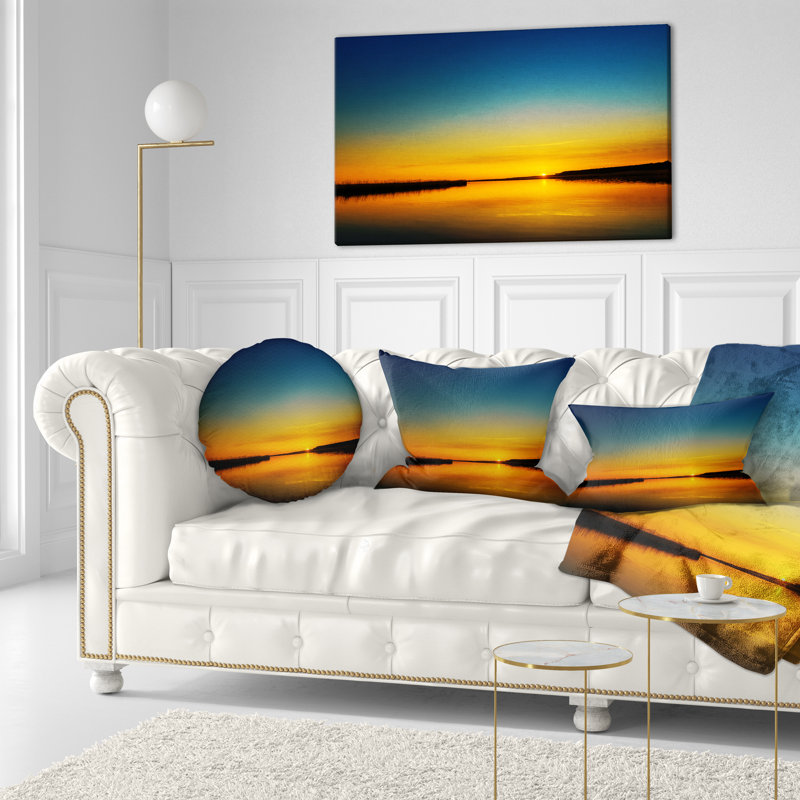Coussin lombaire de soleil sur le fleuve