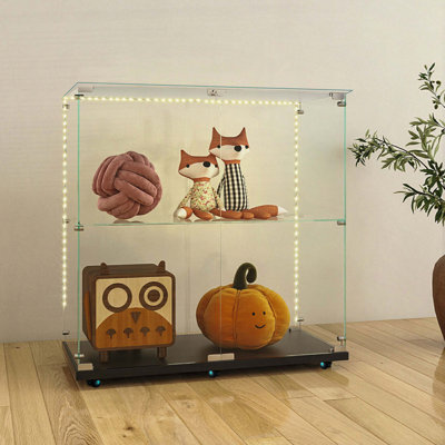 Vitrine en verre trempé avec lumière DEL Bluetooth et roulettes