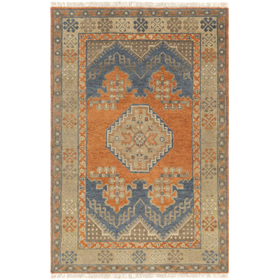 Leung Wool Oriental Area Rug