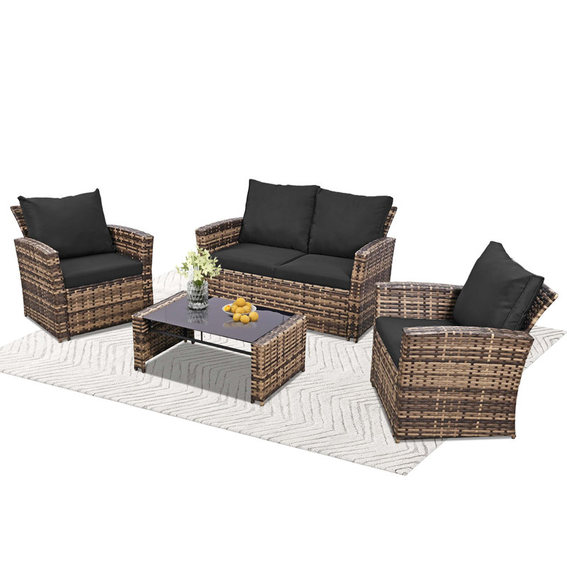 Ensemble de canapé modulaire en osier toutes saisons avec table en verre trempé, sièges rembourrés, conception modulaire et assemblage facile pour une utilisation sur le patio, le jardin ou la cour.