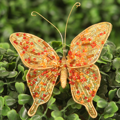 Ornement en forme de papillon de Noël artificiel