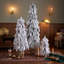 Ensemble de trois sapins de Noël artificiels pré-illuminés et floqués de lumières
