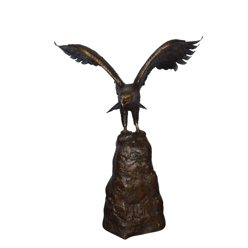 Eagle Landing On A Rock Bronze Statue - Size: 51"L X 36"W X 58"H.