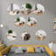 Lit de jour en bois blanc peu encombrant avec fonctions multifonctionnelles