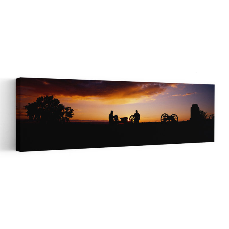Silhouette Of Statues Of Soldiers And Cannons In A Field Gettysburg National Military Park Pennsylvania USA by Al Keuning - Wrapped Canvas Panoramic Print