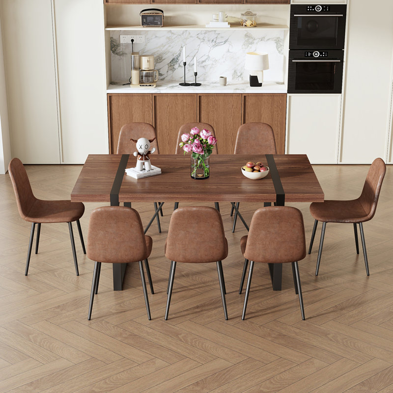 Ensemble de table et de chaises. Table de salle à manger rectangulaire de style industriel de couleur noyer - 71 po x 39,3 po de grande taille. Combinée avec 8 chaises confortables en tissu brun technologie. Convient pour la cuisine, la salle à manger, etc.