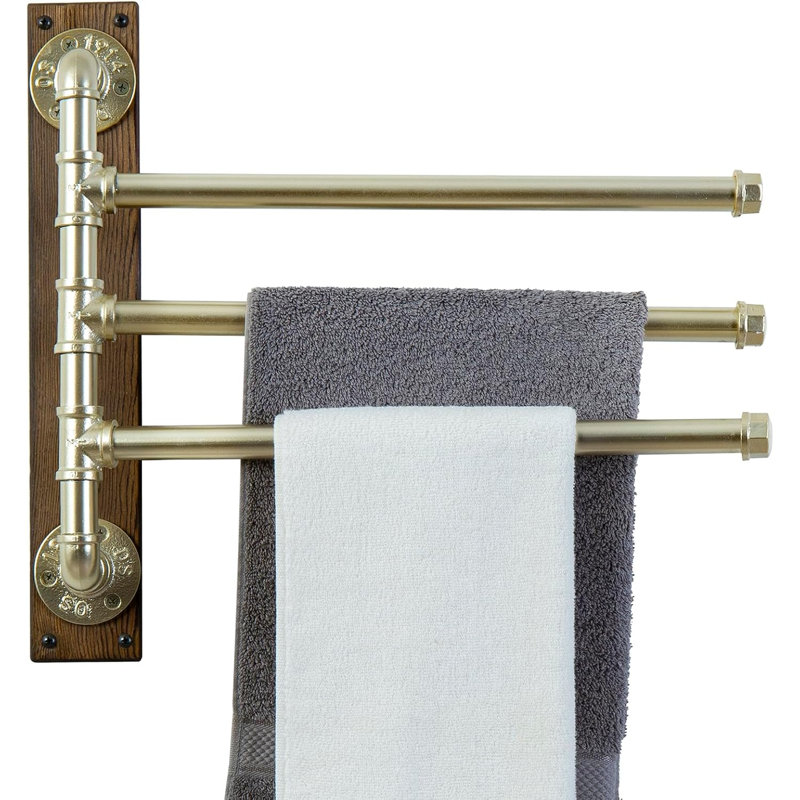 Porte-serviettes mural pivotant à 3 niveaux avec barres métalliques, base en bois et système pivotant. Ce modèle permet de ranger les serviettes de manière organisée et accessible, tout en apportant une touche industrielle rustique aux salles de bain et aux abords de la piscine.