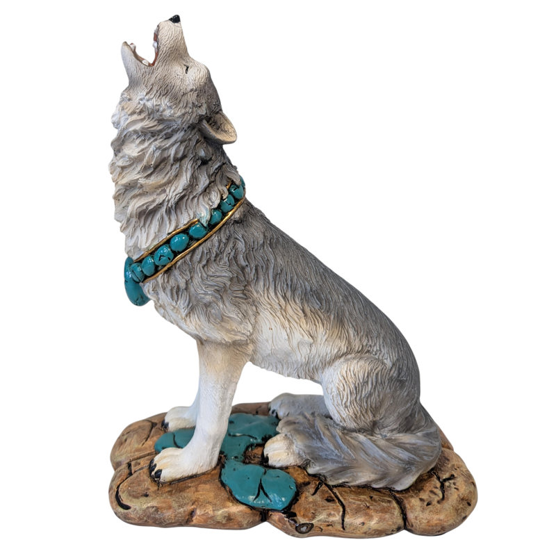 Loup hurlant assis avec des accents turquoise
