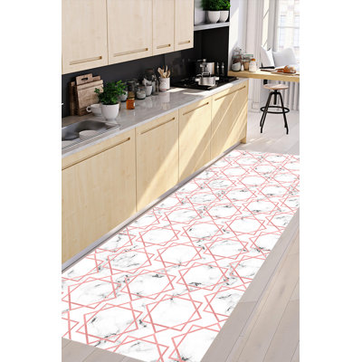Raine Geometric Area Rug