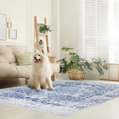 Tapis lavable à la machine avec envers antidérapant à motif floral moderne abstrait bleu marine et crème