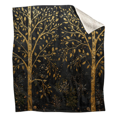 Arbres dorés sur des couvertures noires