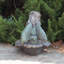 Statue de jardin fée sur un bain d'oiseau en magnésium
