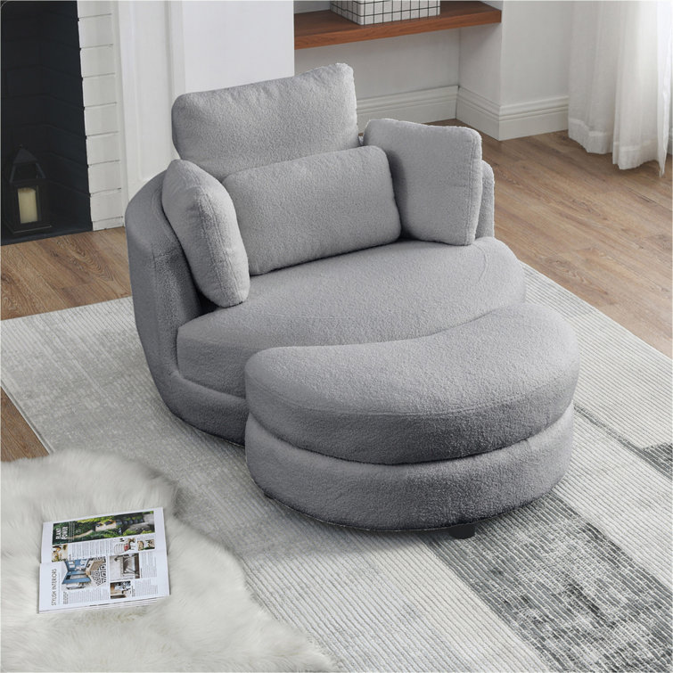 Ivy Bronx Depoliti Oversized Swivel Chair with storage ottoman and