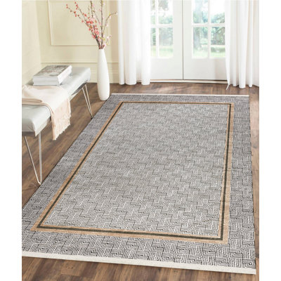 Tapis oriental en viscose tissé à la machine Sumrall en crème / noir / brun clair