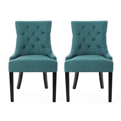 2 chaises de salle à manger - Style contemporain, surpiqûres en losange, accoudoirs inclinés, revêtement, pieds en bois, bleu sarcelle. 2 chaises au design contemporain avec dossier, revêtement en tissu, coloris uni.