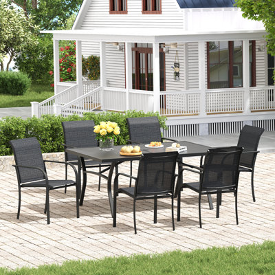 6-Person Patio Dining Set with 63" Rectangular Dining Table and 6 Stackable Textilene Chairs by Red Barrel Studio