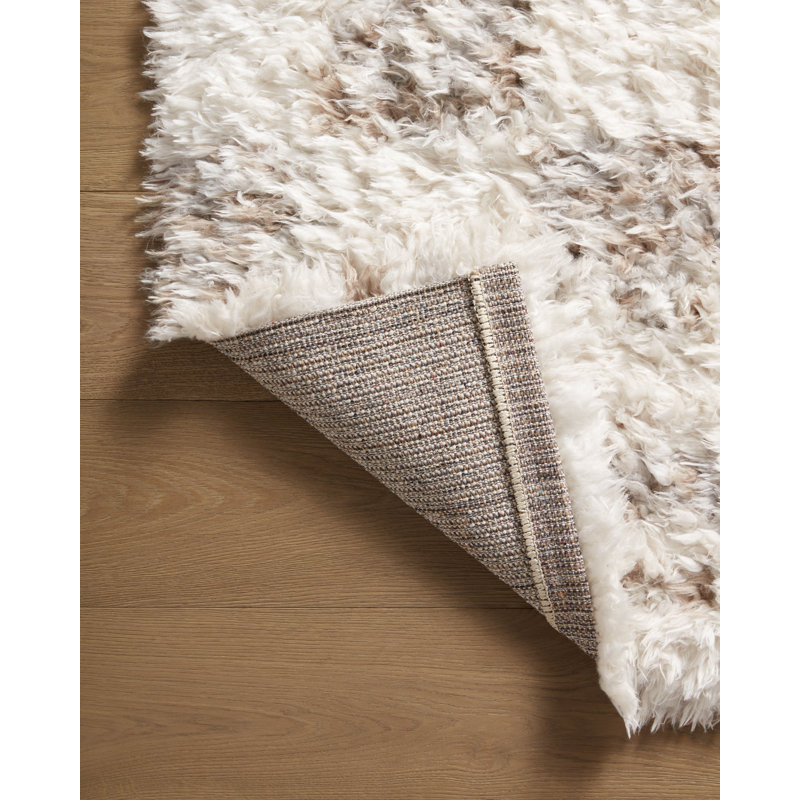Ivory and Pebble Geometric Synthetic 7'-10" x 10' Area Rug