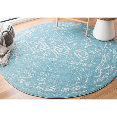 Tapis turquoise / ivoire Strobel