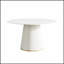 Table de salle à manger ronde moderne en pierre artificielle noire avec base en polyuréthane beige, pouvant accueillir 6 personnes pour des repas et des rassemblements élégants.-488618645-488618643