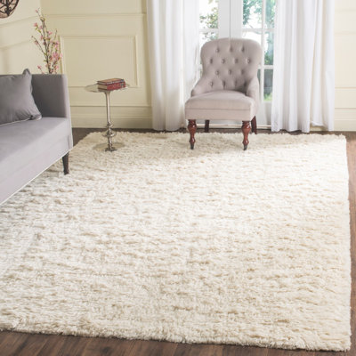 Alimatou Hand Knotted Wool/Cotton Solid Color Rug in Ivory