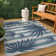Conswello Classic Beach Stripe and Palm Leaf Navy/Cream Indoor/Outdoor Rug