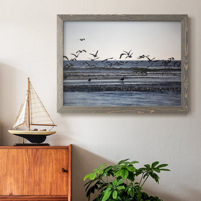 Vol de mouettes encadré sur toile
