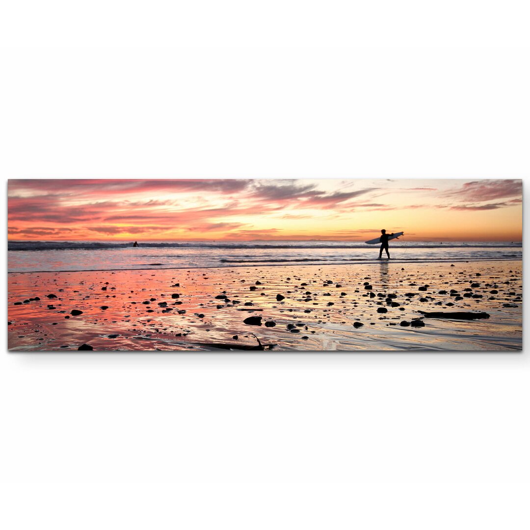 Leinwandbild Surfer im Sonnenuntergang