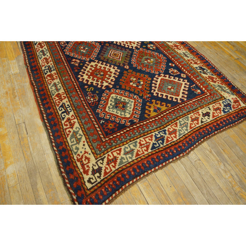 Tapis kazak antique à motif géométrique bleu