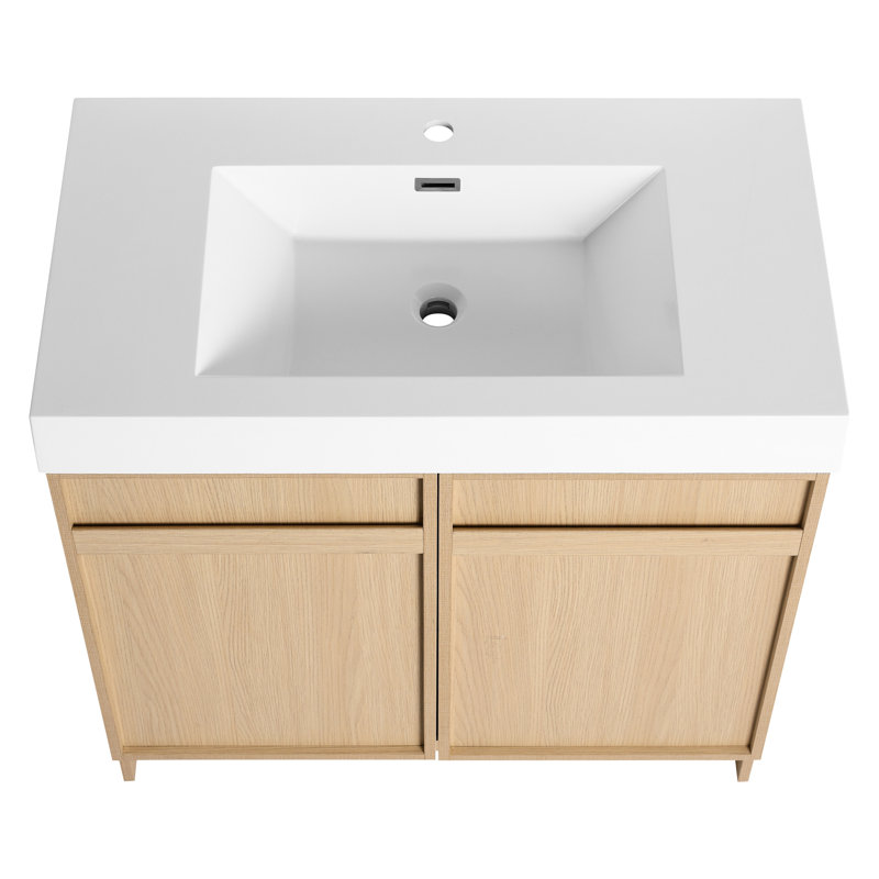 Meuble-lavabo de 36 po avec lavabo en résine. Portes d'armoire à fermeture en douceur de style contemporain. Lavabo autoportant en contreplaqué. Base moderne 2