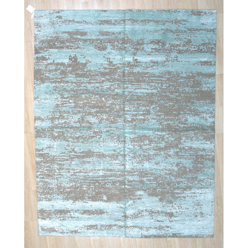 Tapis captivant en laine noué à la main argent