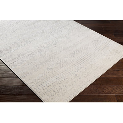 Tapis gris et ivoire tissé au métier mécanique Herrod