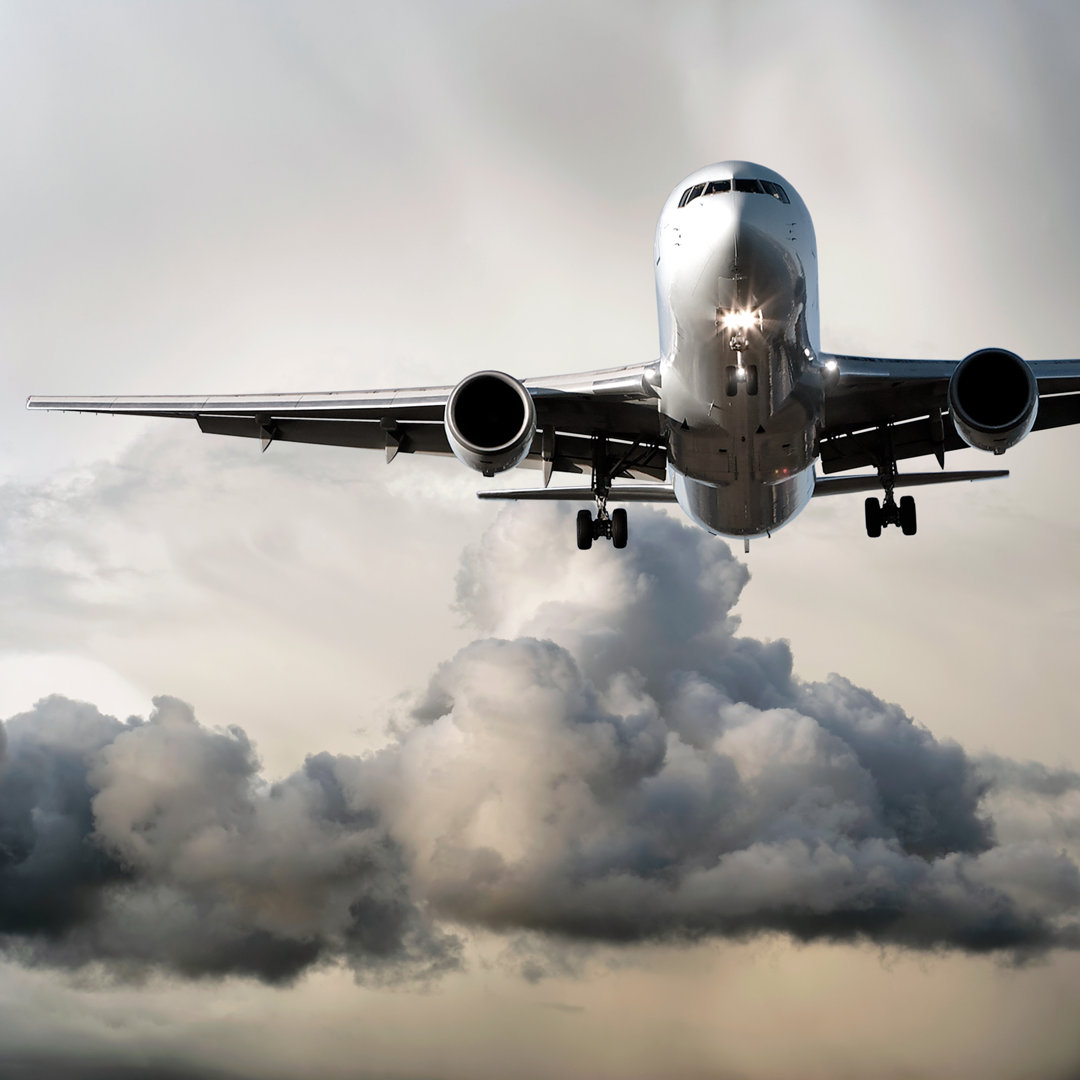 Jet Airplane Landing In Storm von Sharply_done - Kunstdrucke ohne Rahmen auf Leinwand