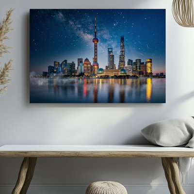 Canvas A Stunning Nighttime Cityscape Featuring A Skyline Dominated By A Wall Art Tall Tower With A Red And White Striped Antenna Canvas Wall Art